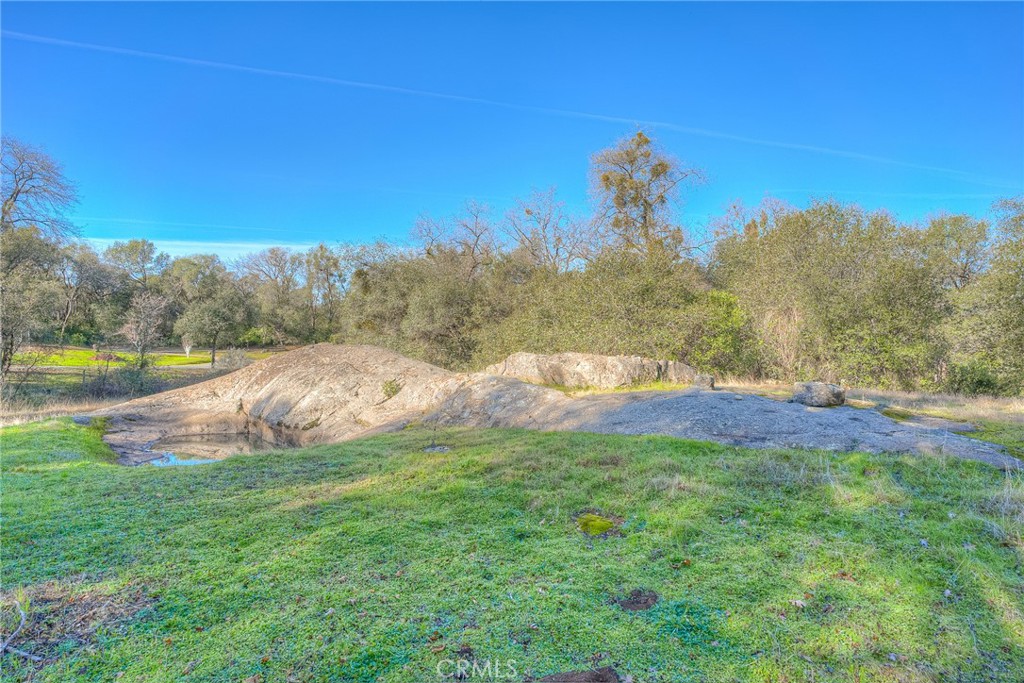15 Hide A Way Road Oroville, CA 95966 - Photo 45 of 63 a view of a lake with a mountain in the background