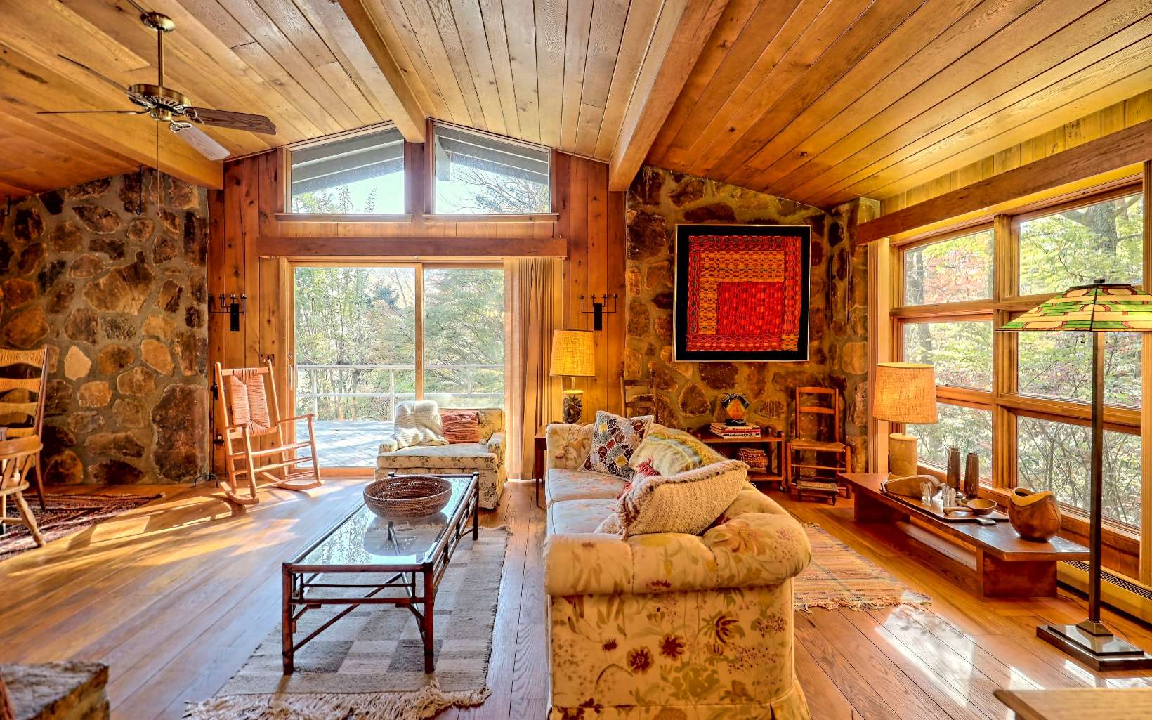 3411 Brasstown Road Brasstown, NC 28902 - Photo 4 of 4 a living room with furniture a rug and a large window