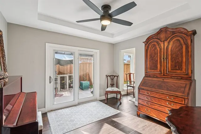 a bedroom with furniture and a window