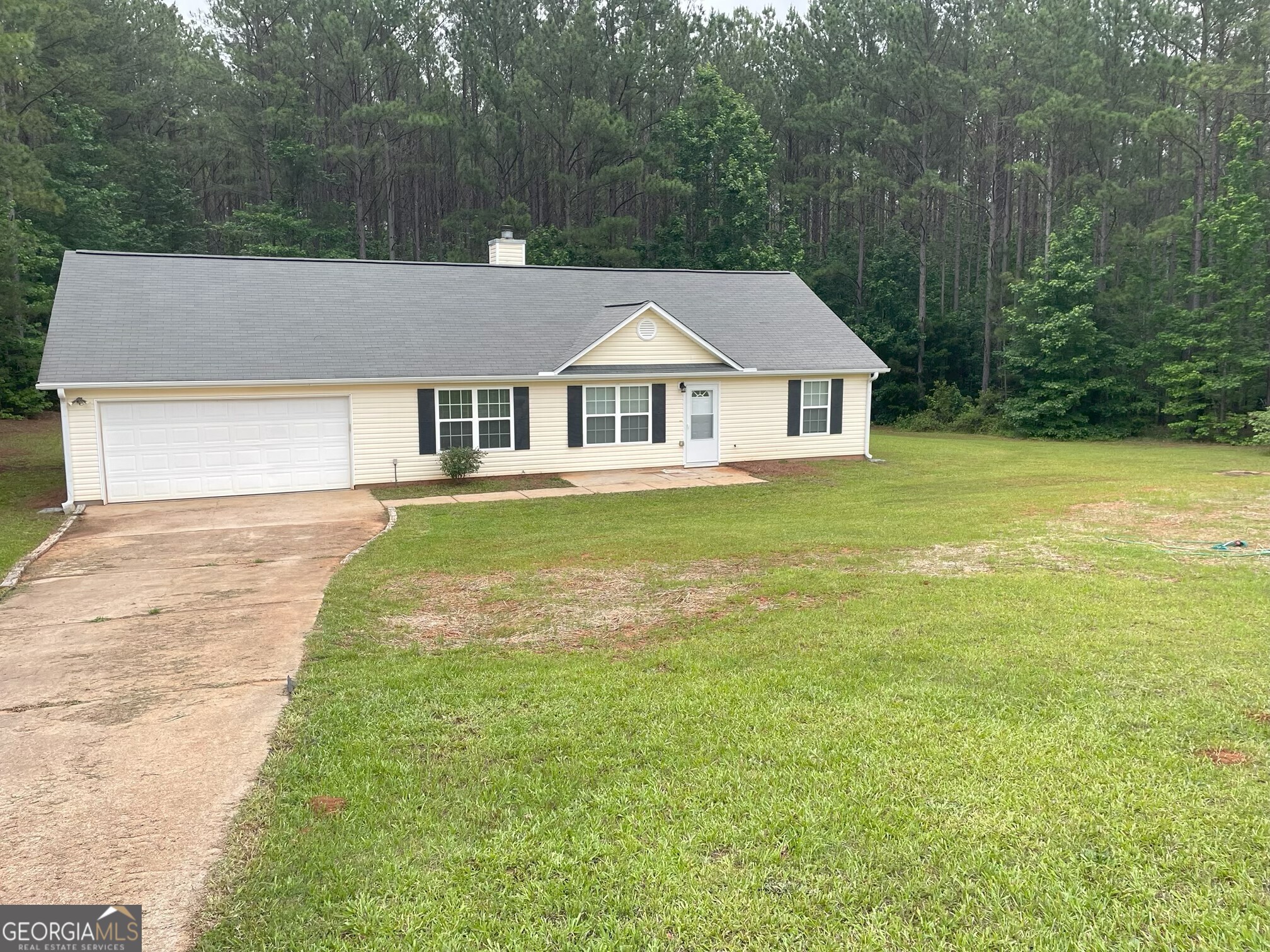134 Cemetary Road Luthersville, GA 30251 - Photo 4 of 18 front view of a house with a yard