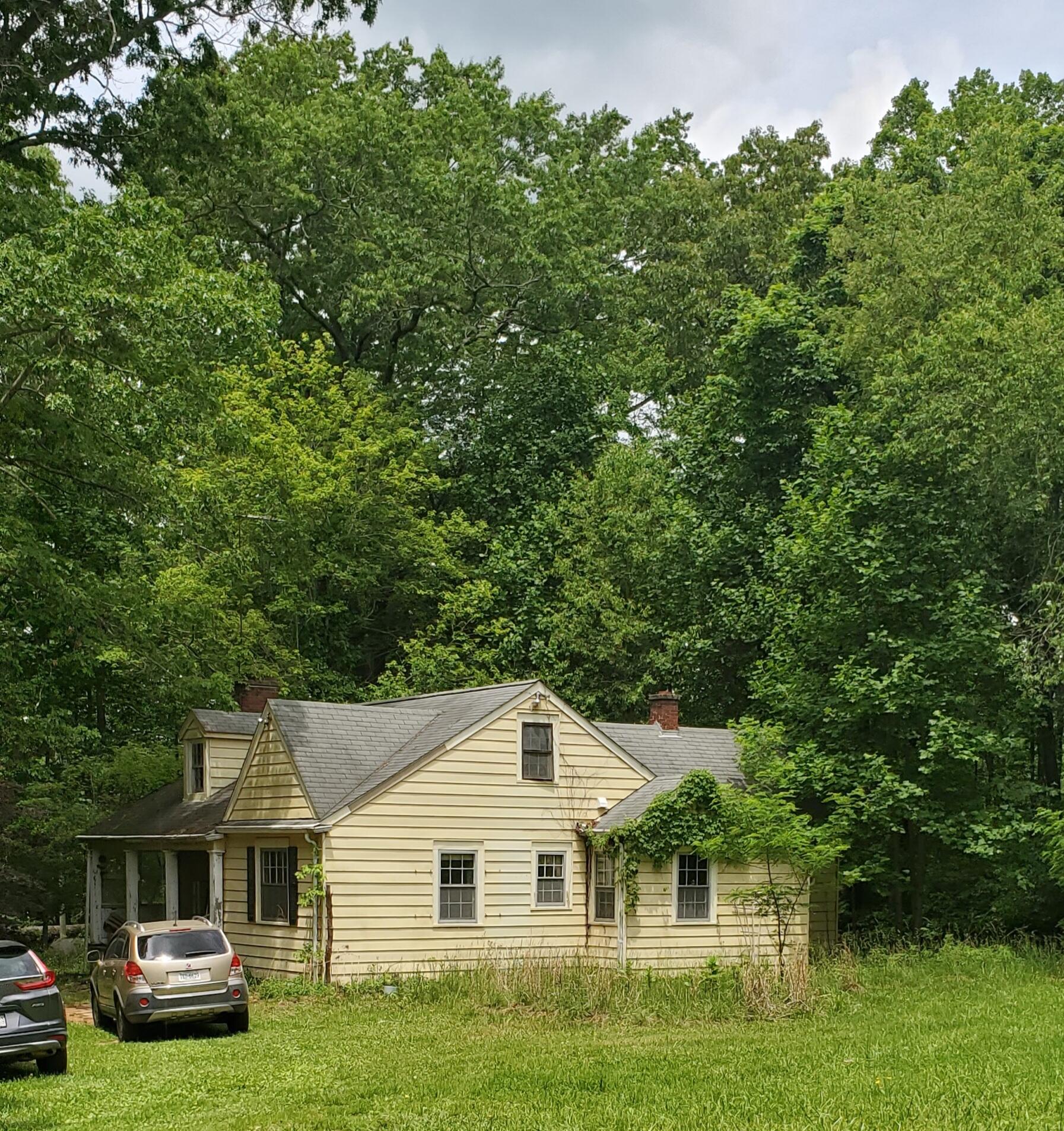 1745 Kings Store Road Northeast Check, VA 24072 - Photo 1 of 1 a front view of a house with a garden