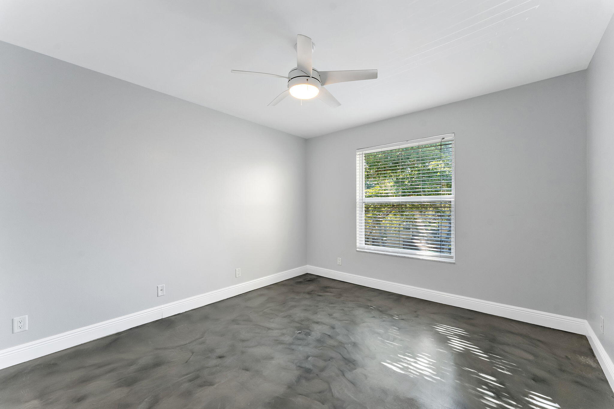 470 Northwest 20th Street, Unit 3070 Boca Raton, FL 33431 - Photo 14 of 22 an empty room with a window