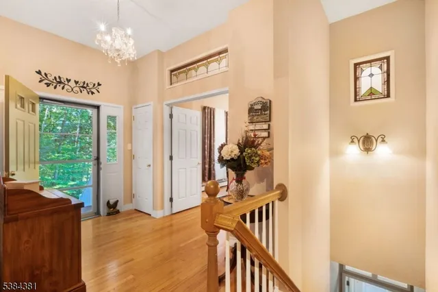 a bedroom with a bed and flat screen tv