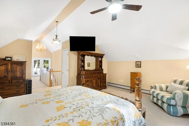 a view of a hallway view with wooden floor and windows