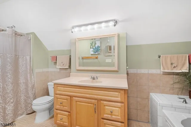 a view of a two chairs in the balcony