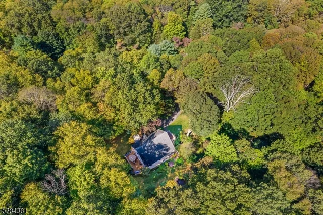 a kitchen with a sink and a chair