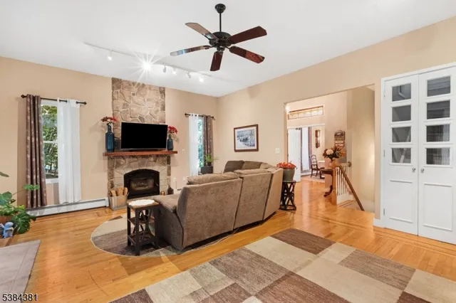 a living room with furniture and a rug