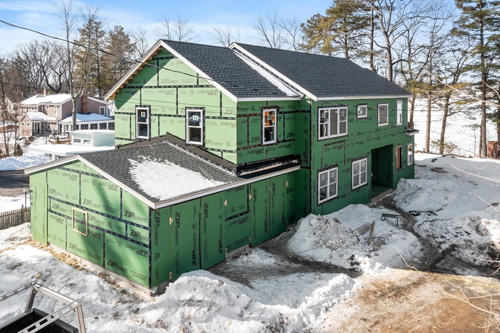 72 Laurel Lane, Unit 2 Lunenburg, MA 01462 - Photo 7 of 18 a view of a house with a yard