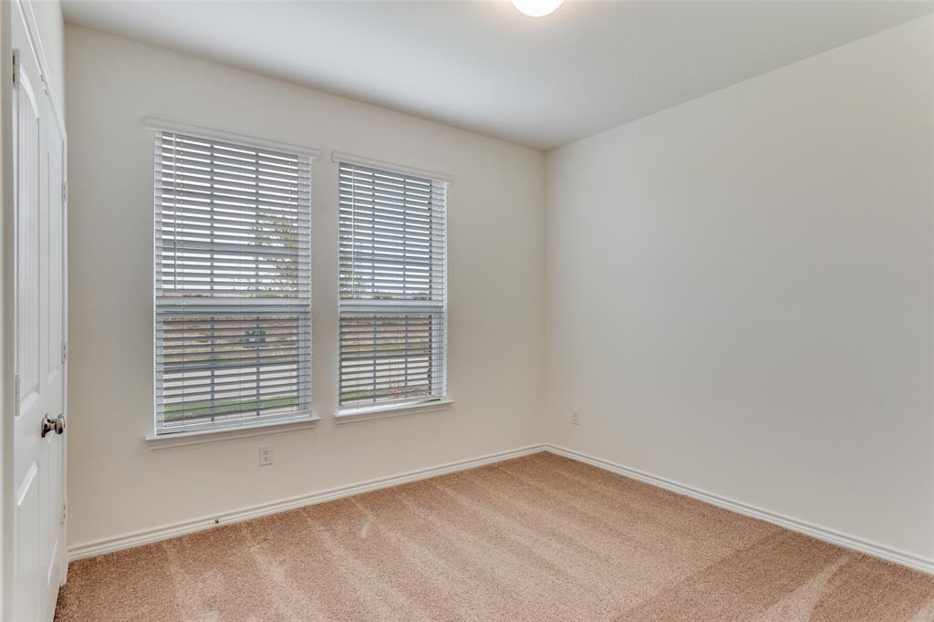 649 Fallbrook Drive Aledo, TX 76008 - Photo 14 of 30 a view of an empty room with a window