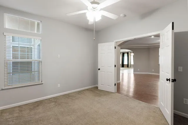 a kitchen with stainless steel appliances a refrigerator and stove
