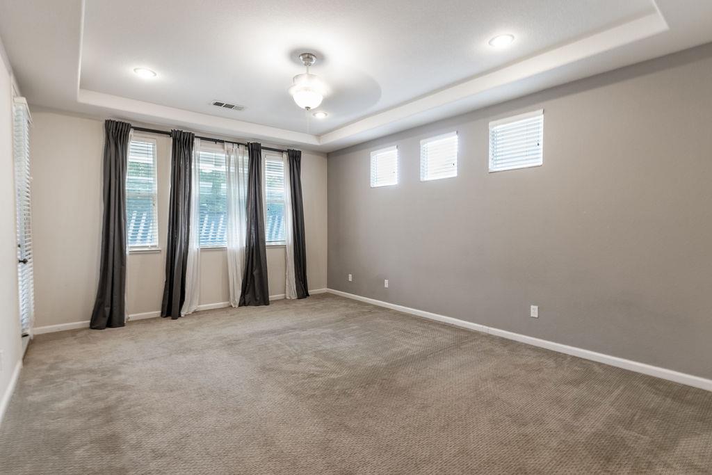 3604 Hillglen Avenue Modesto, CA 95355 - Photo 24 of 56 an empty room with windows and closet