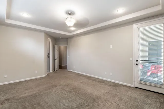 a bathroom with double vanity and mirrors