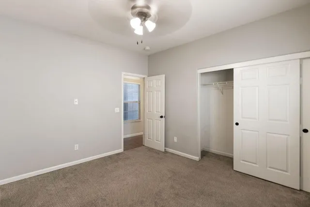 a bathroom with a mirror and a sink