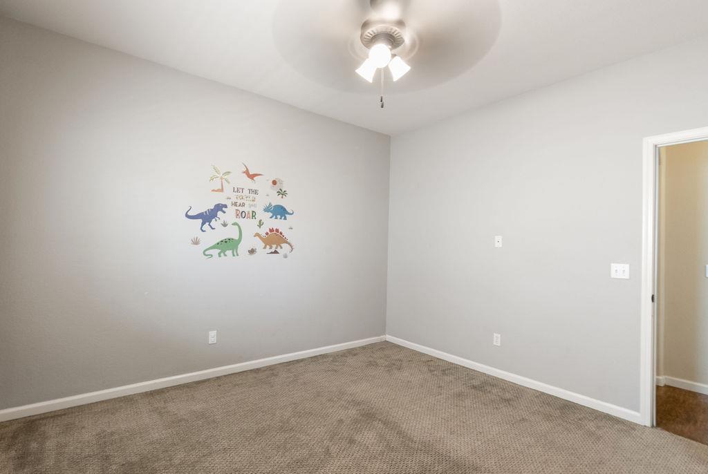 3604 Hillglen Avenue Modesto, CA 95355 - Photo 36 of 56 an empty room with a window