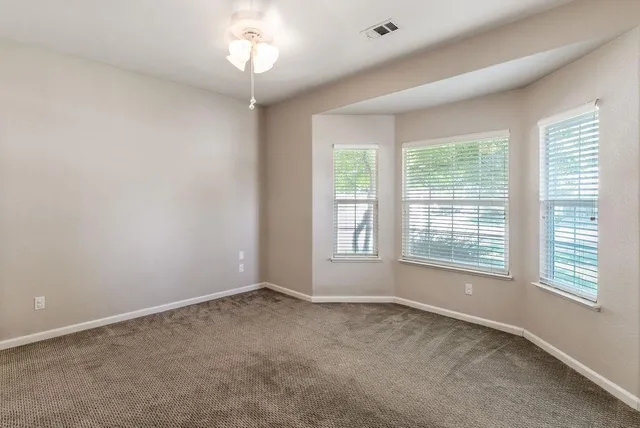 a view of a backyard with a barbeque