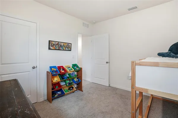 a room with toys and storage