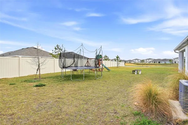 a view of a lake with a big yard