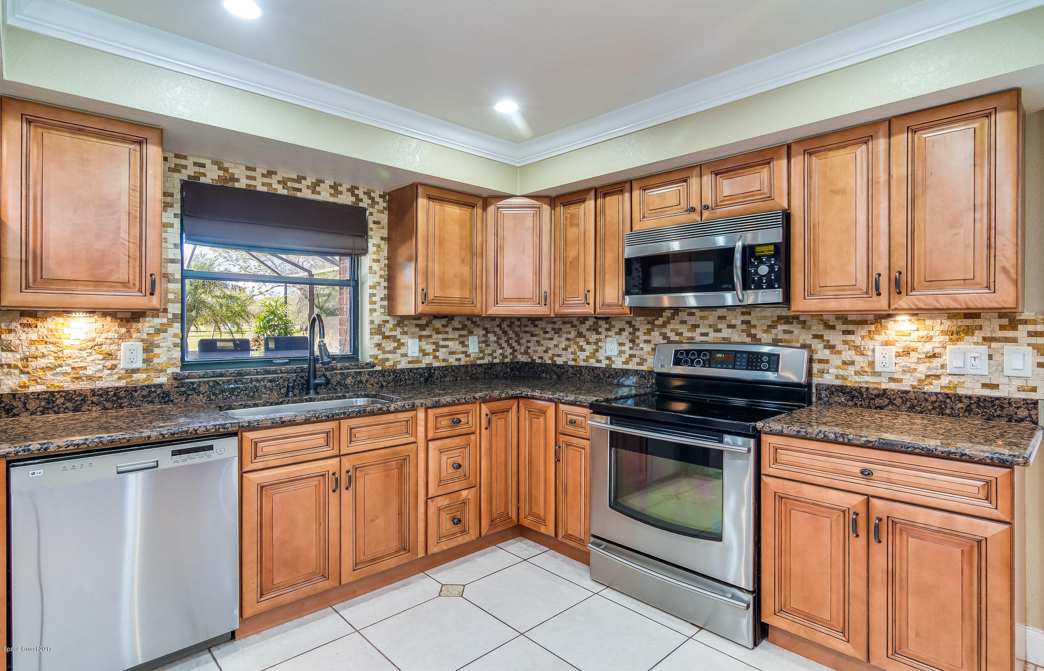 2500 Turtle Mound Road Melbourne, FL 32934 - Photo 15 of 43 Pass Through to Summer Kitchen