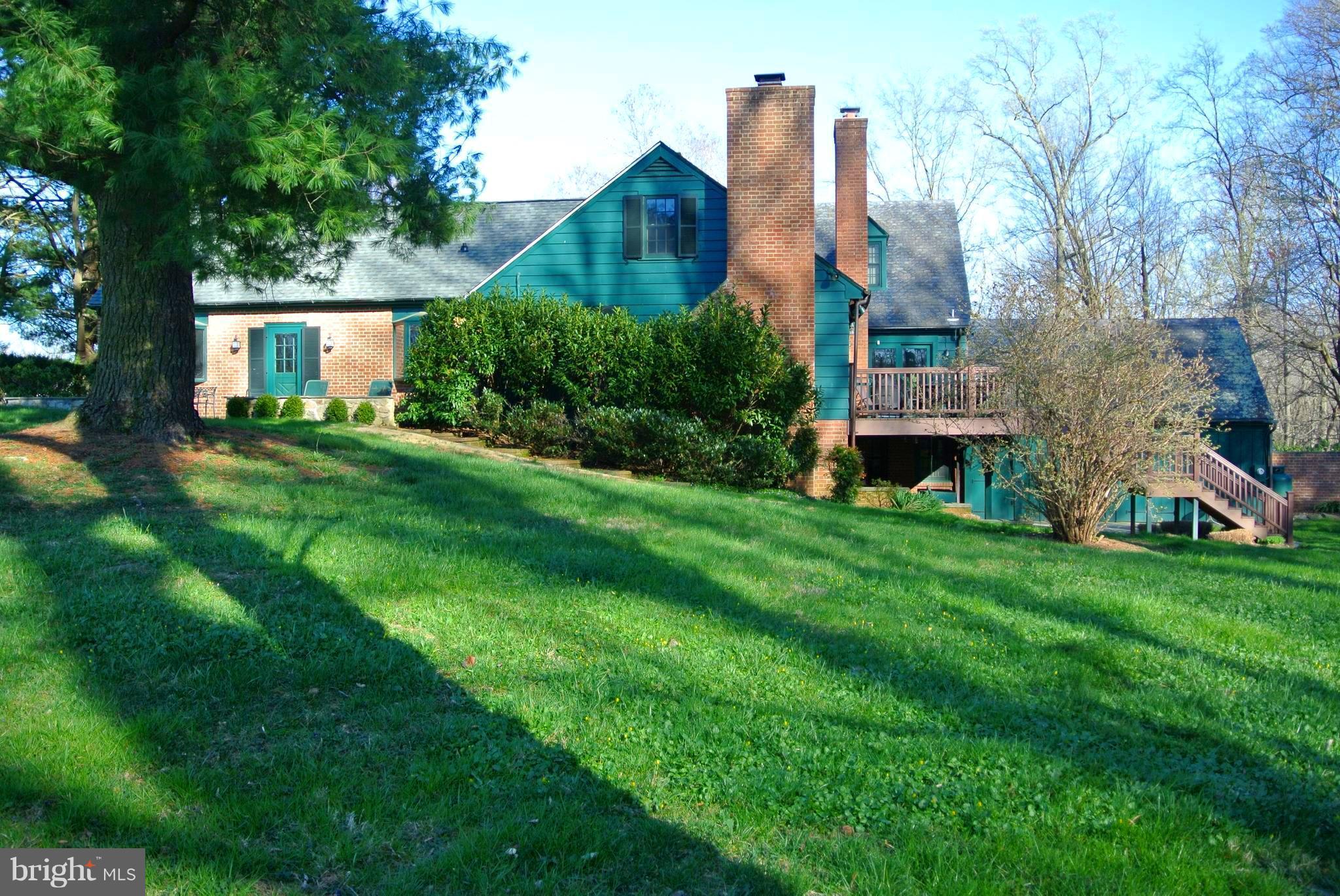 3864 Butler Road Reisterstown, MD 21136 - Photo 11 of 24 a aerial view of a house with a yard table and chairs