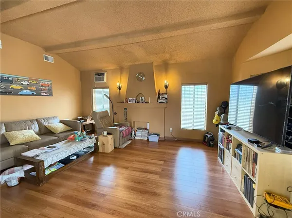 a bedroom with a bed and furniture