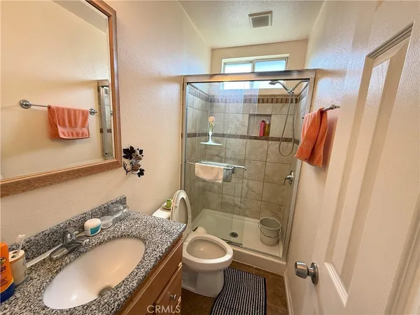 a bedroom with a bed and furniture