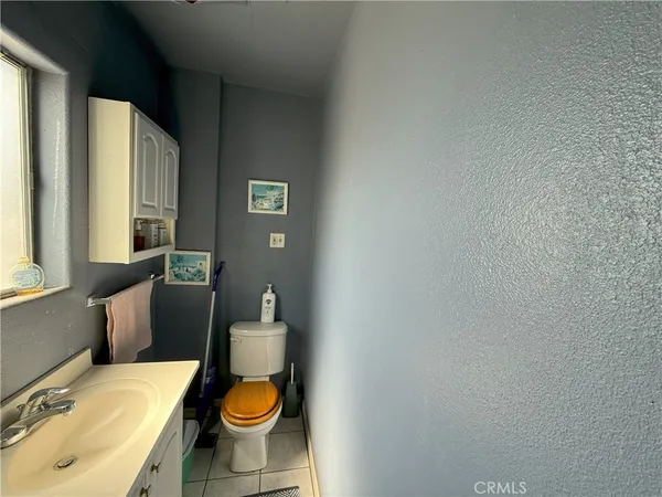 a view of a car in front of a building