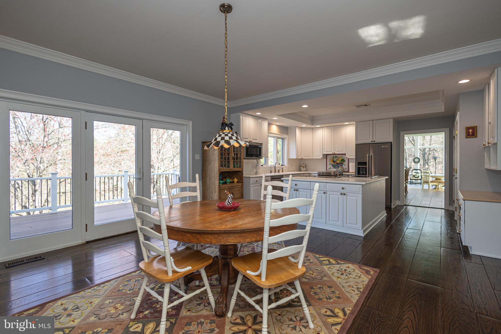 1045 Washington Crossing Road Newtown, PA 18940 - Photo 21 of 67 a view of a dining room with furniture window and wooden floor