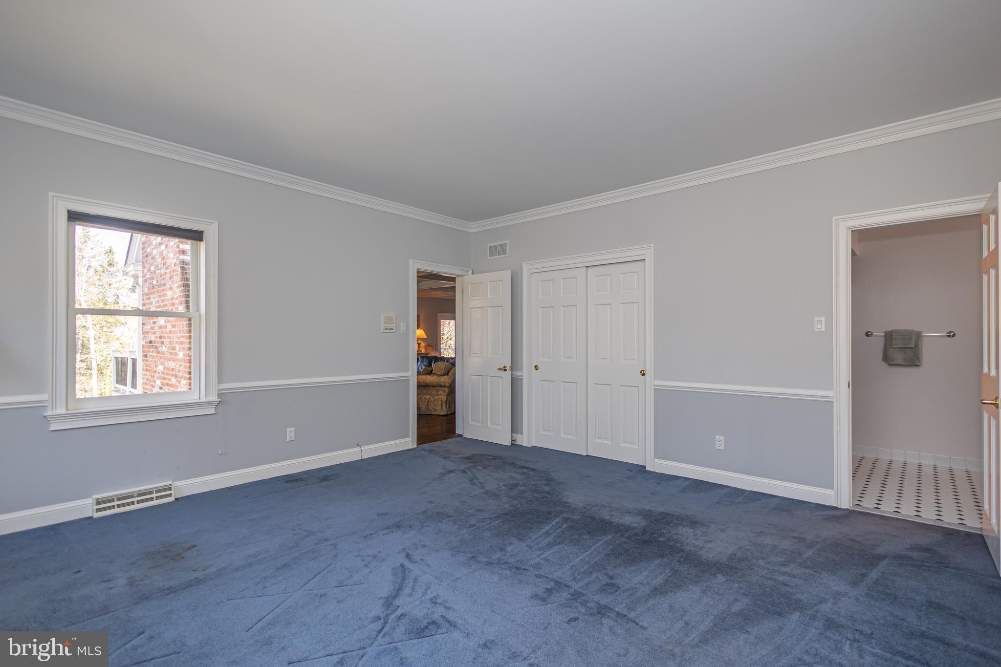 1045 Washington Crossing Road Newtown, PA 18940 - Photo 25 of 67 a view of an empty room with wooden floor and a window