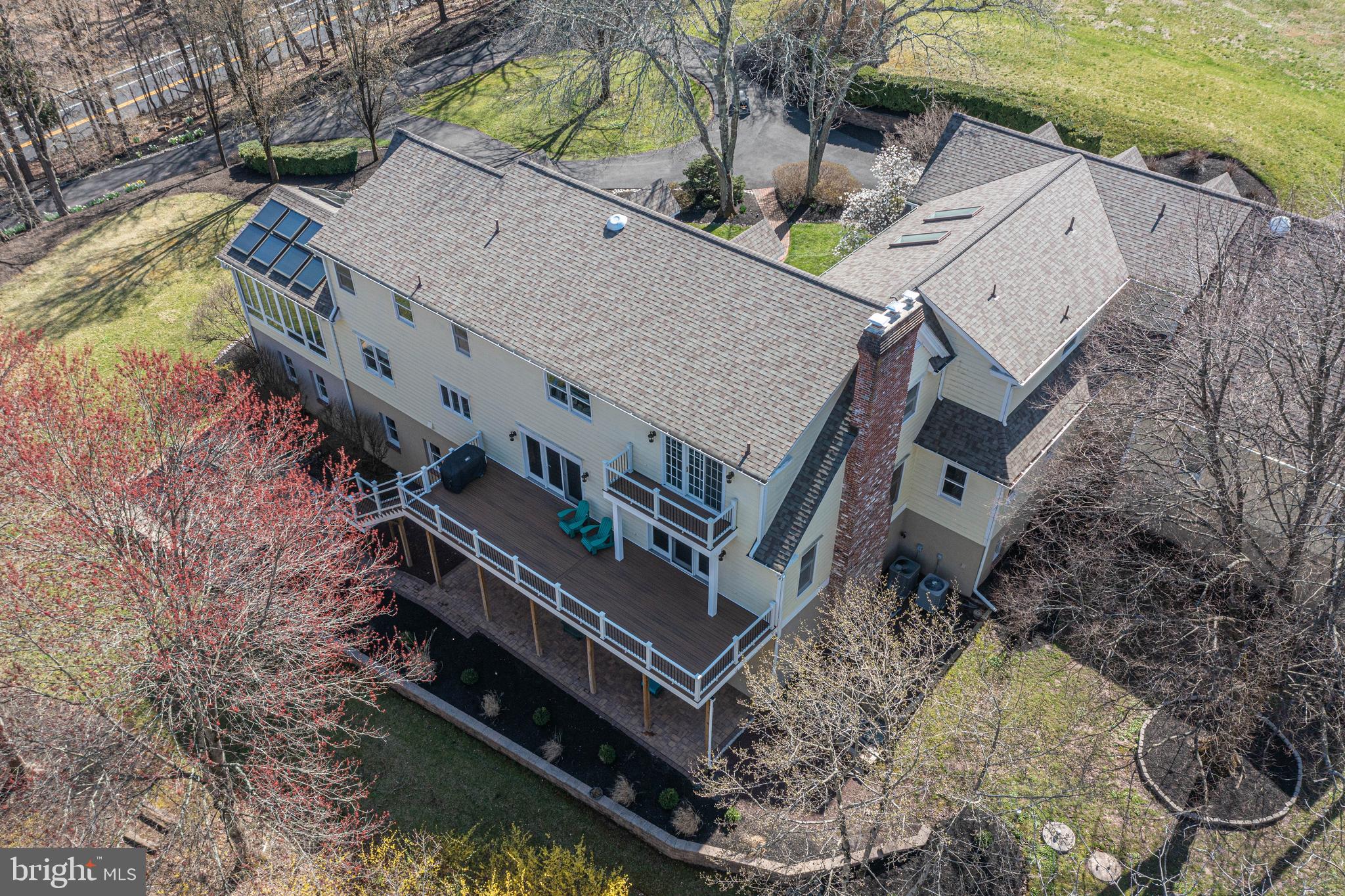 1045 Washington Crossing Road Newtown, PA 18940 - Photo 54 of 67 an aerial view of a house with a yard and a large tree
