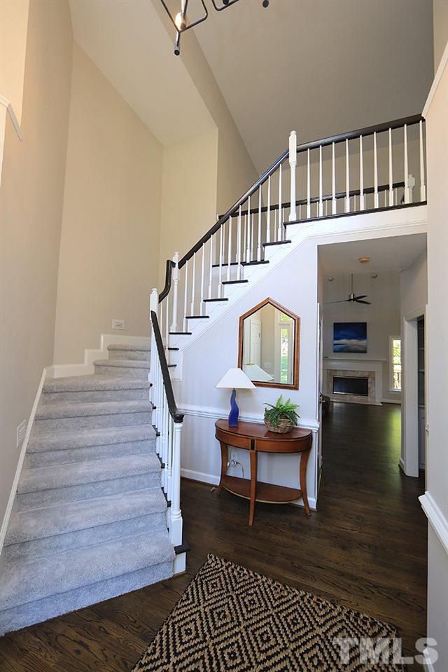 1901 Russell Drive Raleigh, NC 27612 - Photo 2 of 18 Open Foyer with Accent Window on 2nd Level, Turned Staircase, Overlook and Refinished Hardwood Floors.