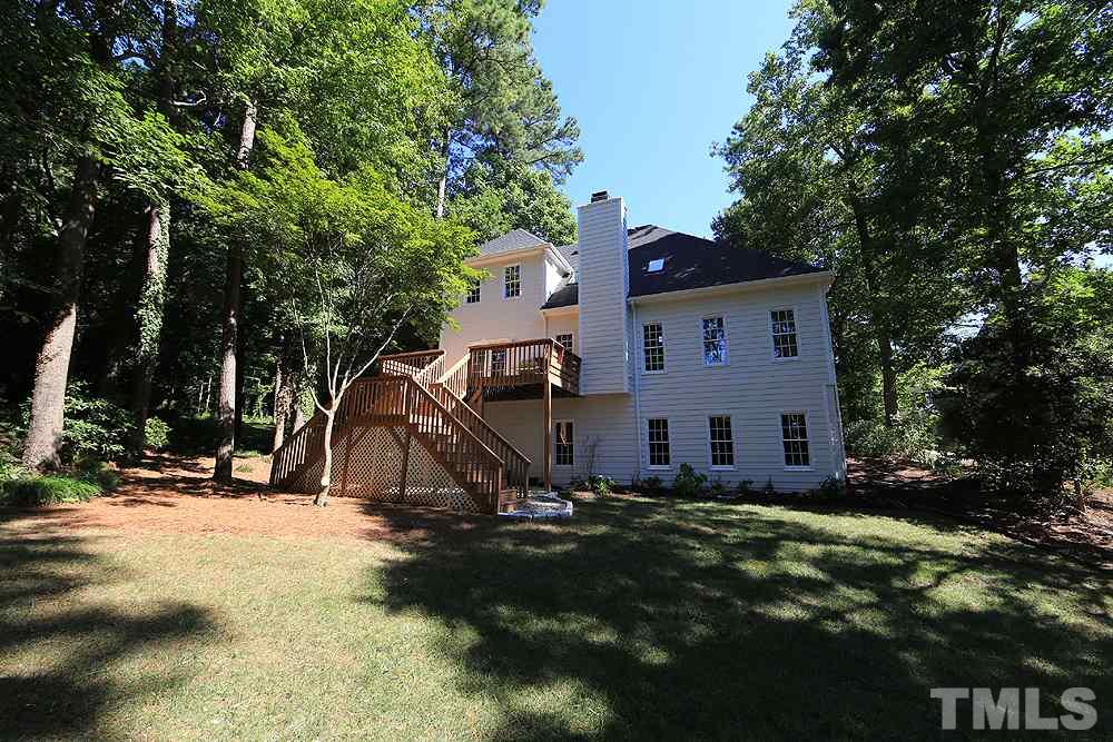 1901 Russell Drive Raleigh, NC 27612 - Photo 17 of 18 Deck with Double Stairs & Patio.