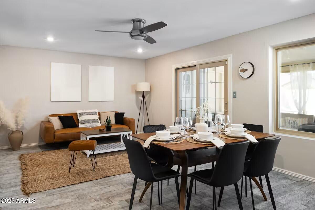 922 West Monte Avenue Mesa, AZ 85210 - Photo 13 of 41 a living room with furniture kitchen view and a window