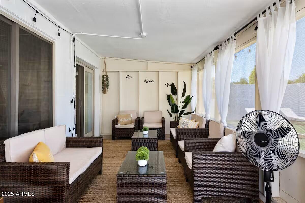 922 West Monte Avenue Mesa, AZ 85210 - Photo 19 of 41 a living room with furniture and wooden floor