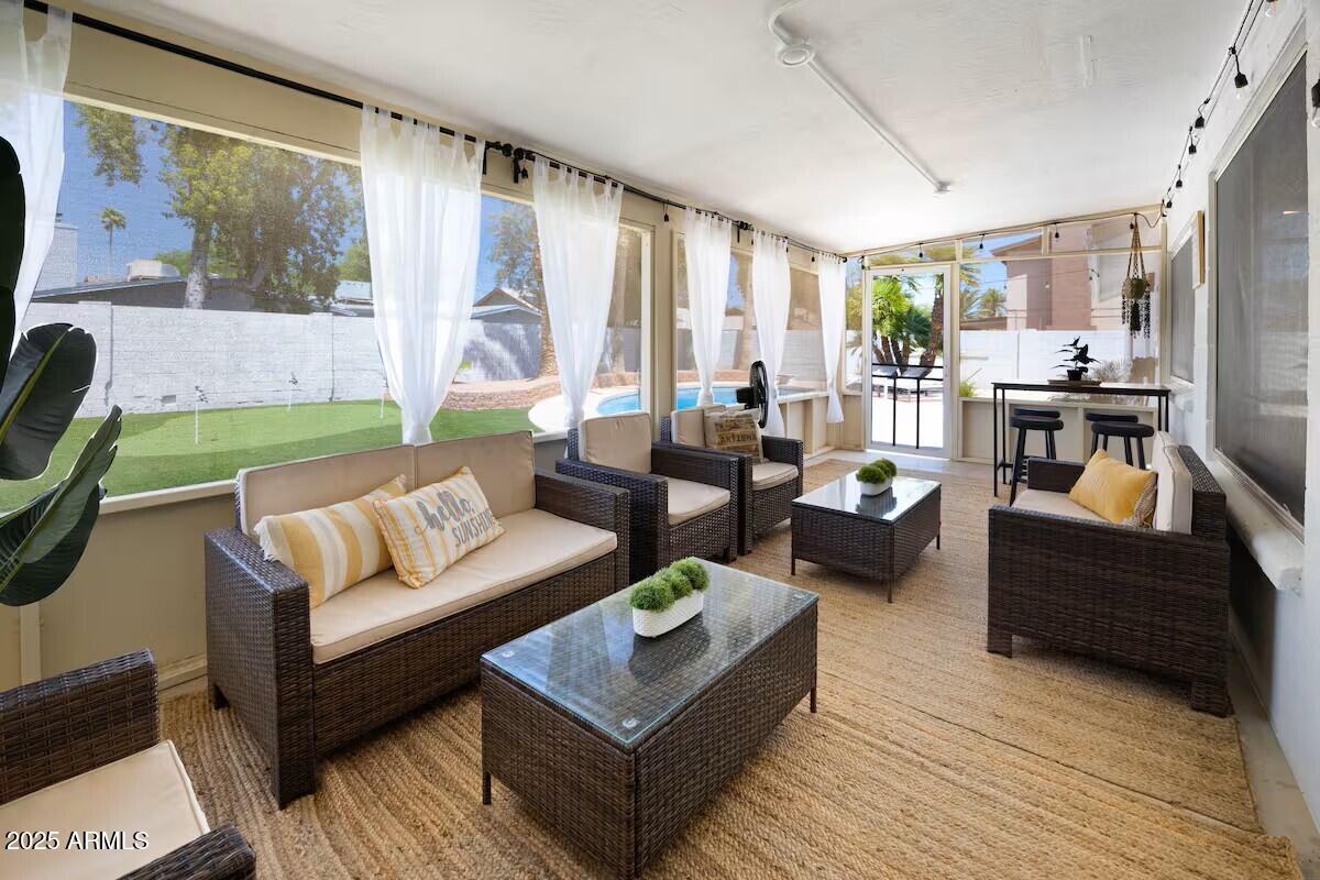 922 West Monte Avenue Mesa, AZ 85210 - Photo 21 of 41 a living room with furniture and a large window