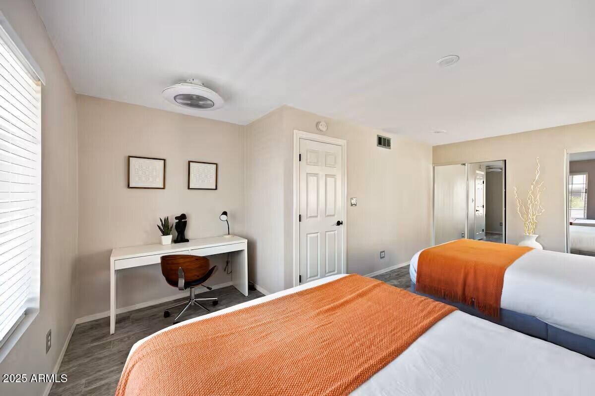 922 West Monte Avenue Mesa, AZ 85210 - Photo 23 of 41 a bedroom with two beds and a window