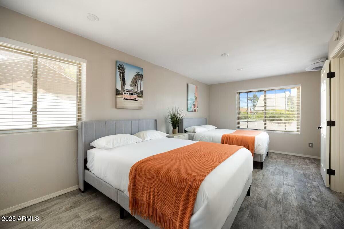 922 West Monte Avenue Mesa, AZ 85210 - Photo 25 of 41 a bedroom with two beds and a window with outer view