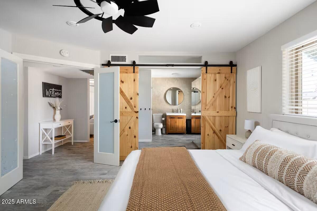 922 West Monte Avenue Mesa, AZ 85210 - Photo 31 of 41 a bedroom with furniture and a bed