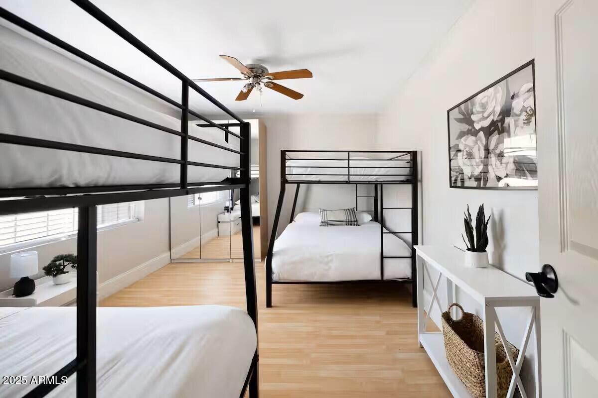 922 West Monte Avenue Mesa, AZ 85210 - Photo 35 of 41 a bedroom with furniture and a window