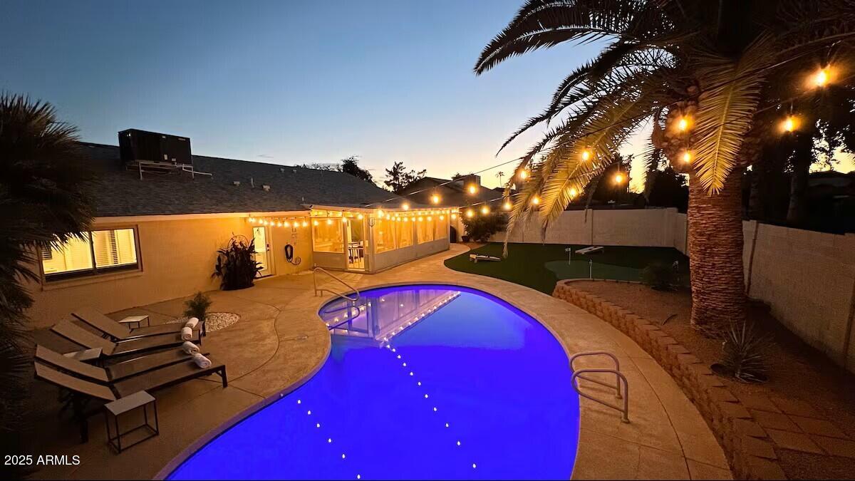 922 West Monte Avenue Mesa, AZ 85210 - Photo 36 of 41 a view of swimming pool with outdoor seating