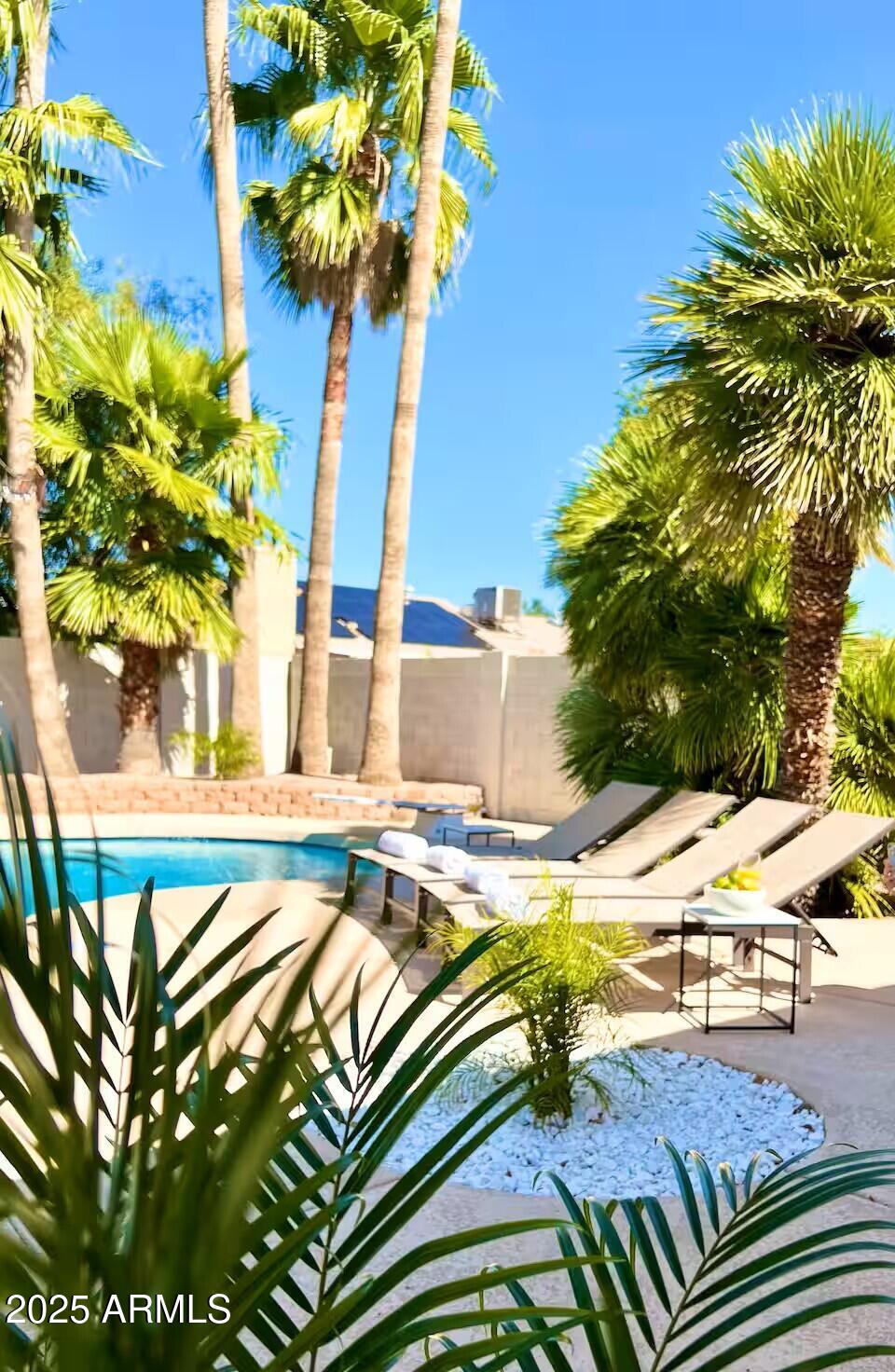 922 West Monte Avenue Mesa, AZ 85210 - Photo 39 of 41 a view of a swimming pool with a yard