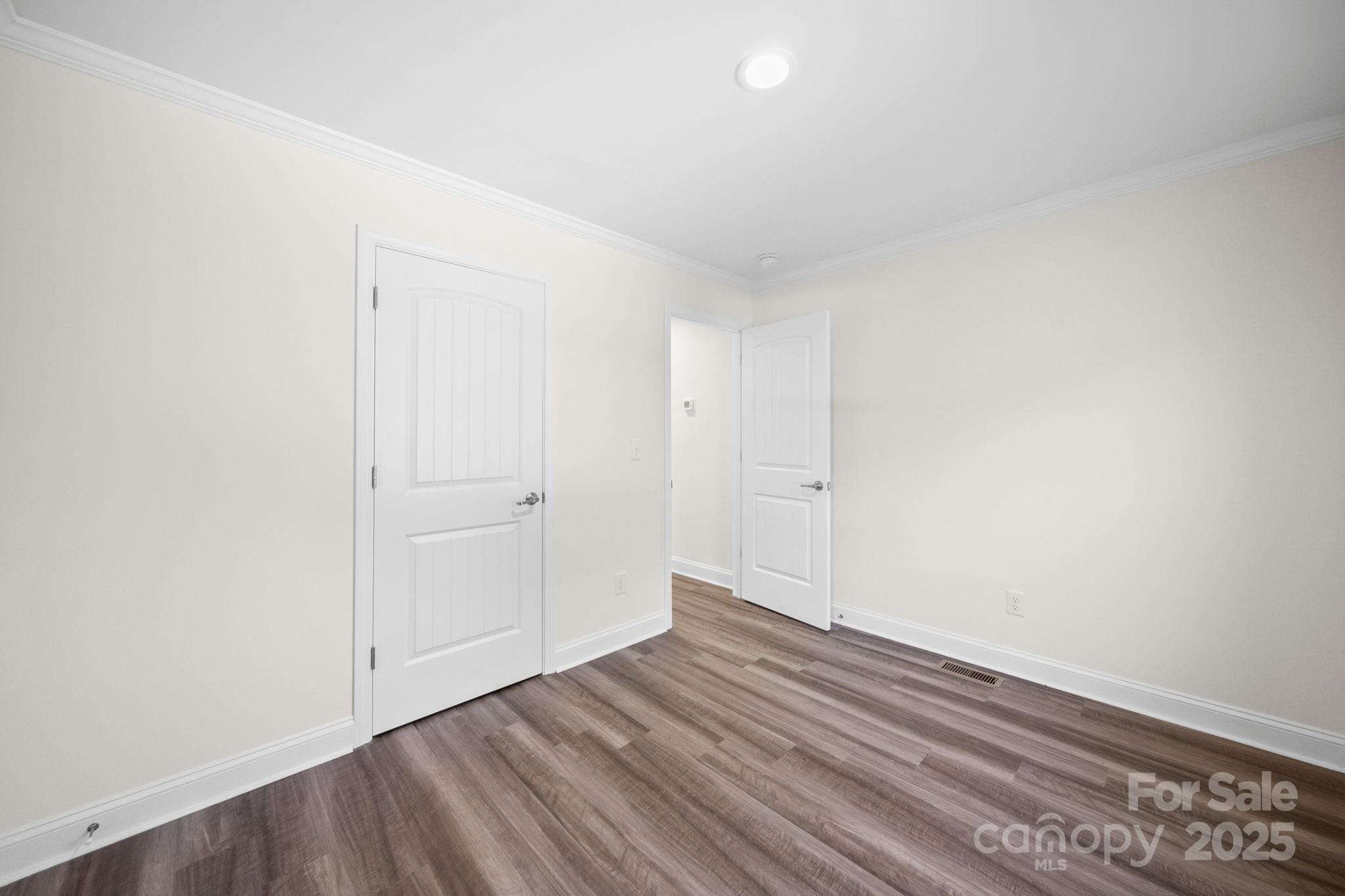 159 Hallman Street Cherryville, NC 28021 - Photo 17 of 22 a view of an empty room and wooden floor