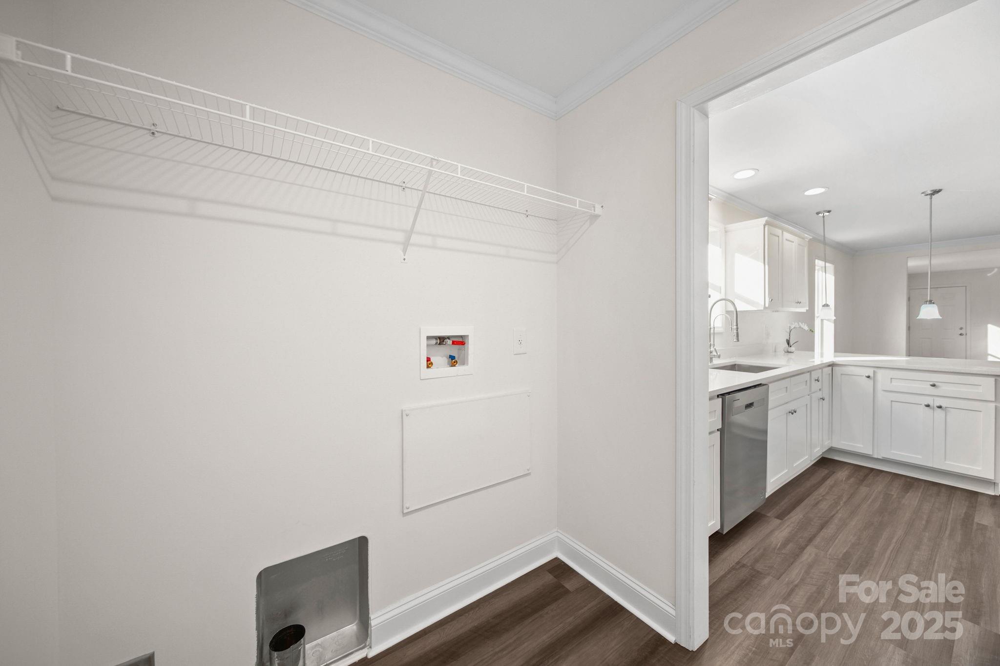 159 Hallman Street Cherryville, NC 28021 - Photo 9 of 22 a kitchen with cabinets and wooden floor