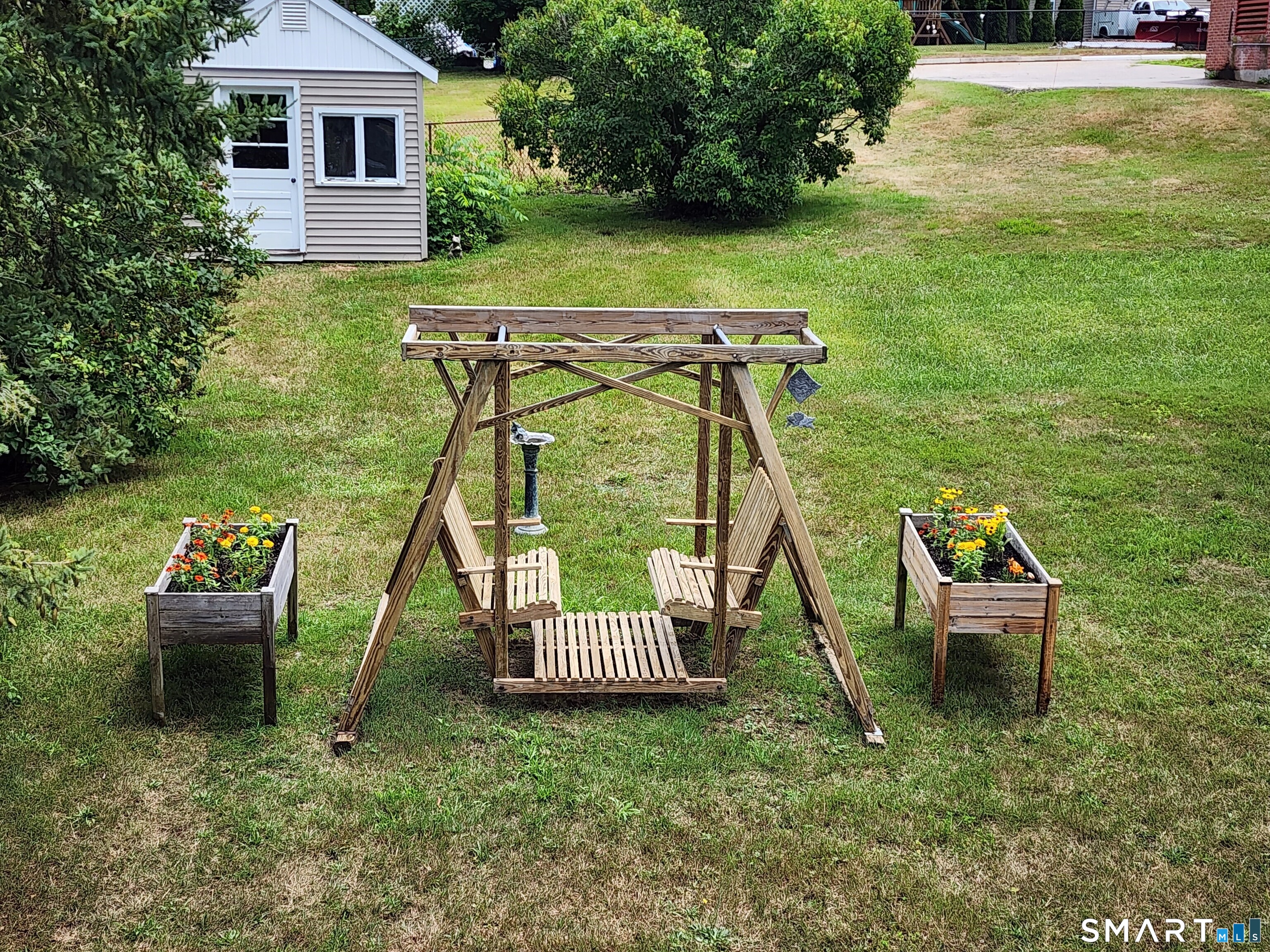 7 East Pattagansett Road East Lyme, CT 06357 - Photo 19 of 21 Back yard with swing