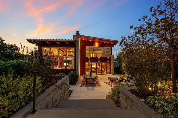 a front view of a house with a garage