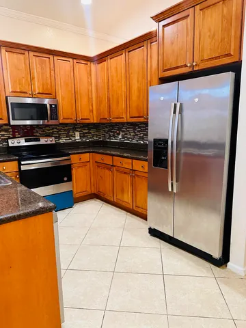 a view of a yard in front of a house
