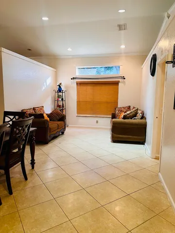 a room with furniture and a window