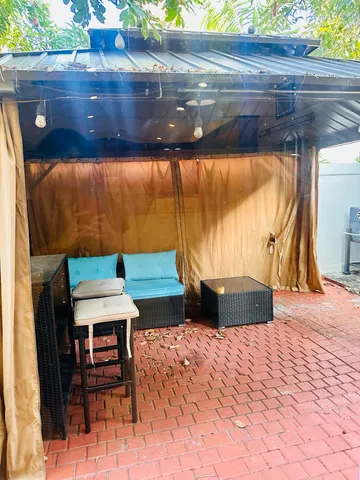 a view of a swimming pool with a patio