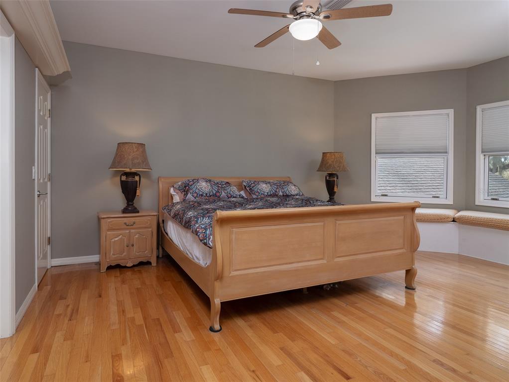 4986 Southwest 7th Avenue Road Ocala, FL 34471 - Photo 22 of 39 a bedroom with a bed and window