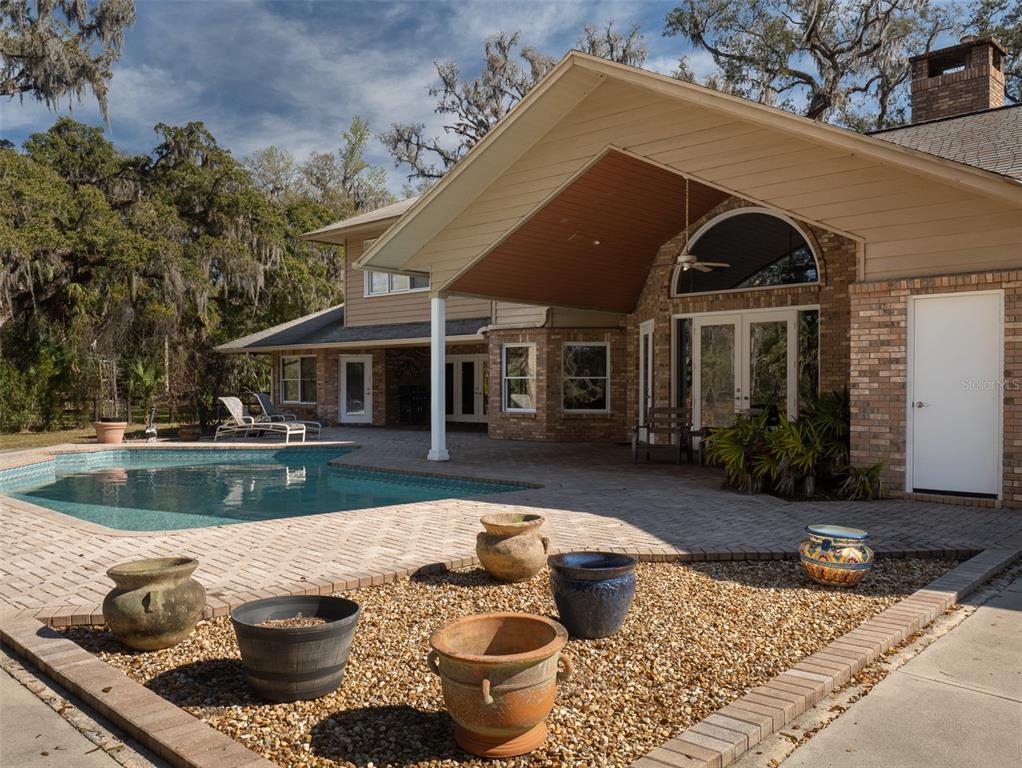 4986 Southwest 7th Avenue Road Ocala, FL 34471 - Photo 26 of 39 a view of house and outdoor space
