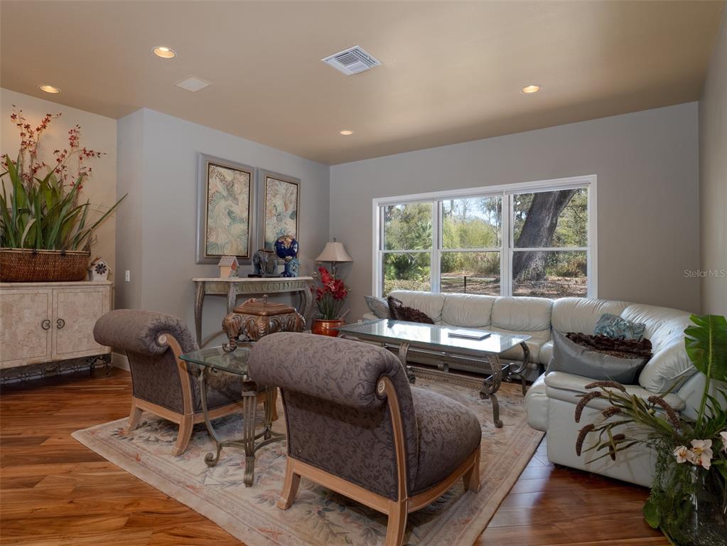 4986 Southwest 7th Avenue Road Ocala, FL 34471 - Photo 5 of 39 a living room with furniture and window